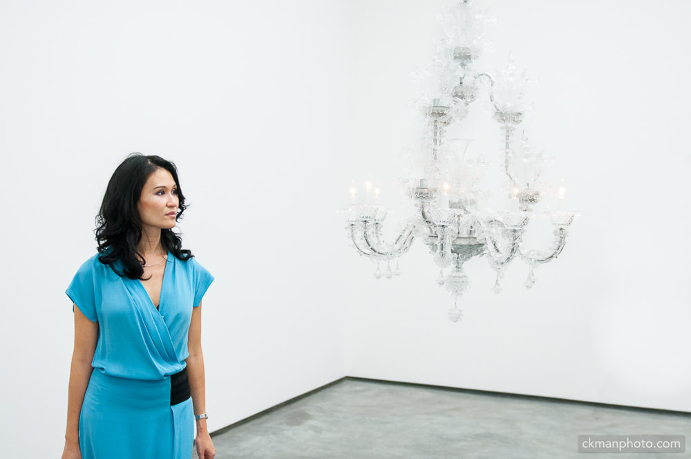 chandelier and lady in blue dress
