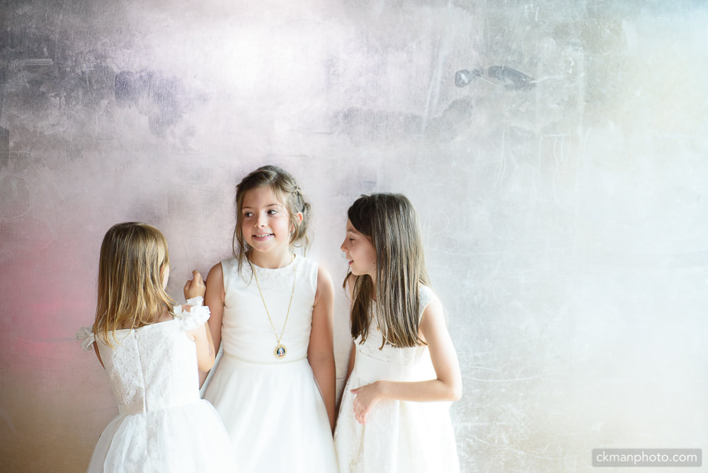 3 girls in white dresses