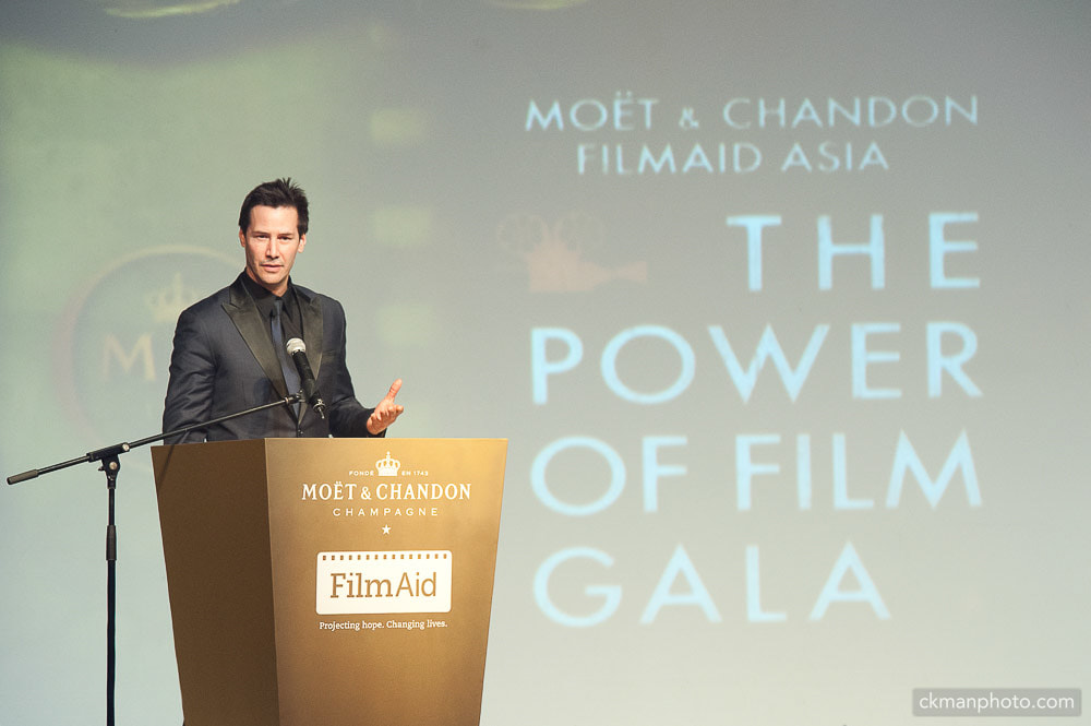 Keanu Reeves delivering speech at The Power of Film FilmAid gala Asia in Grand Hyatt Hong Kong, photography by C.K. Man