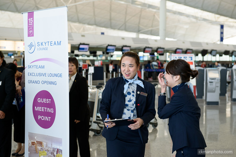 Skyteam exclusive lounge grand opening guest meeting point served by ground staff in Hong Kong International Airport departure hall